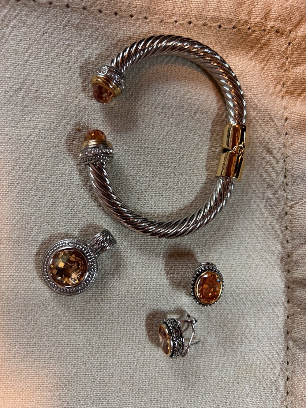 Twisted two tone bangle, pendant and earrings
